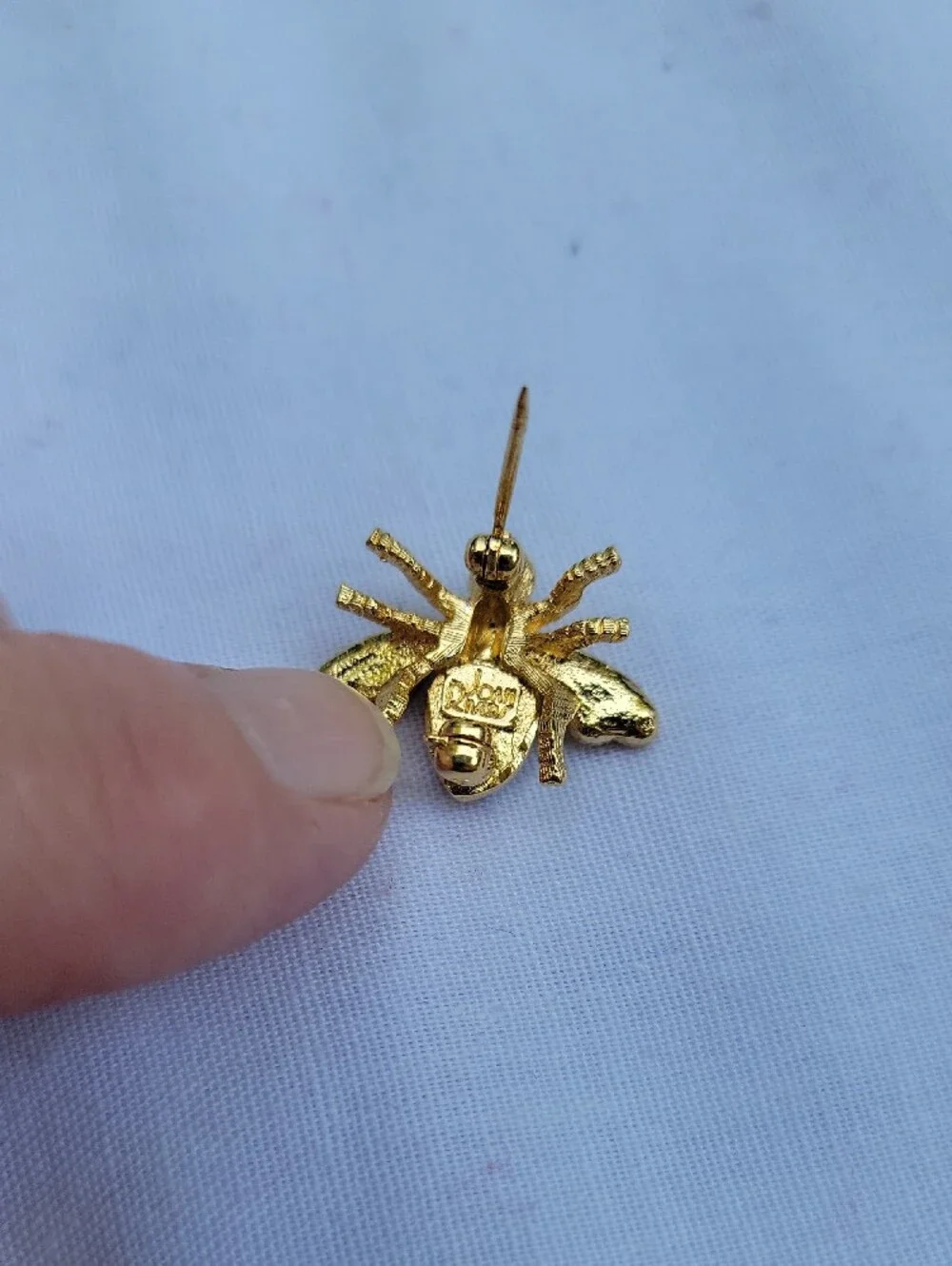 Vintage Joan Rivers Gold Tone Bee Brooch with Clear Crystals and Green Eyes